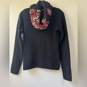 Elegant Black Sweater with Vibrant Collar
